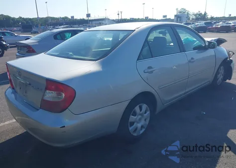 2002 Toyota Camry Le from USA, damaged, VIN 4T1BE32K22U530911